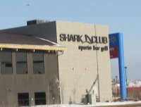 Store front for Shark Club Sports Bar & Grill